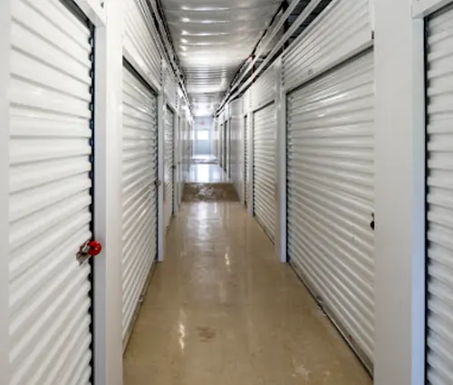 Indoor climate-controlled storage hallway at Highway 16 Self Storage
